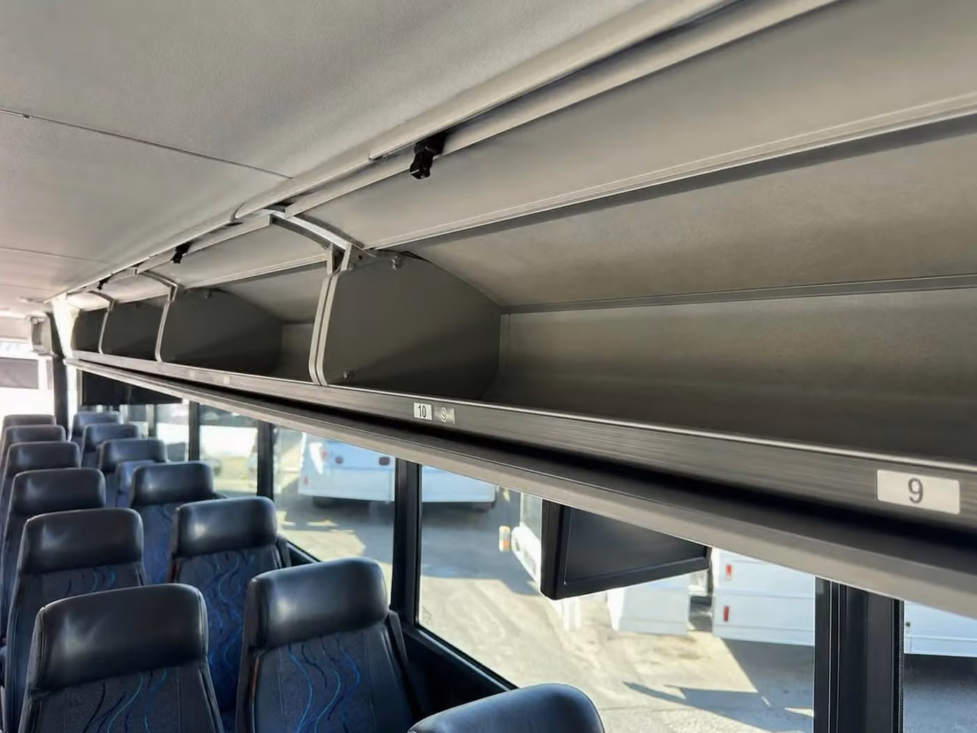 englewood 25 passenger minibus overhead storage