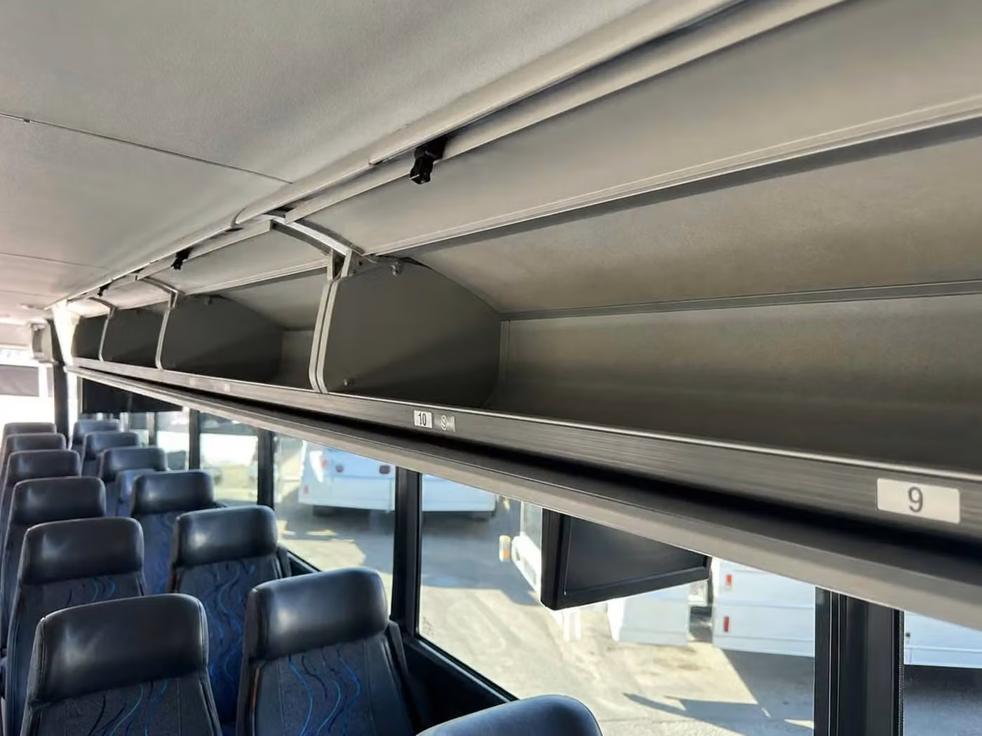 englewood 56 passenger charter bus overhead storage